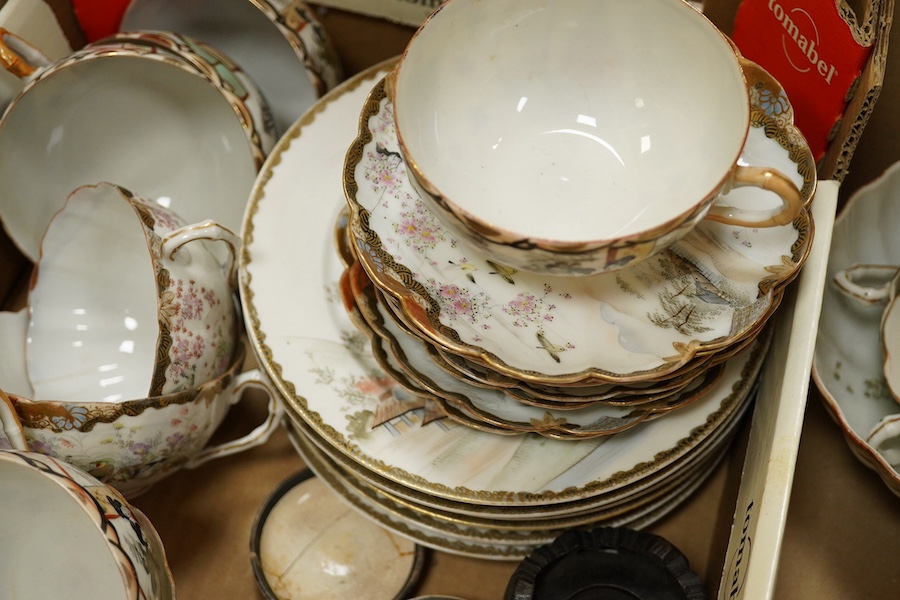 A Japanese eggshell tea and coffee set and three Chinese blue and white seal paste boxes and covers